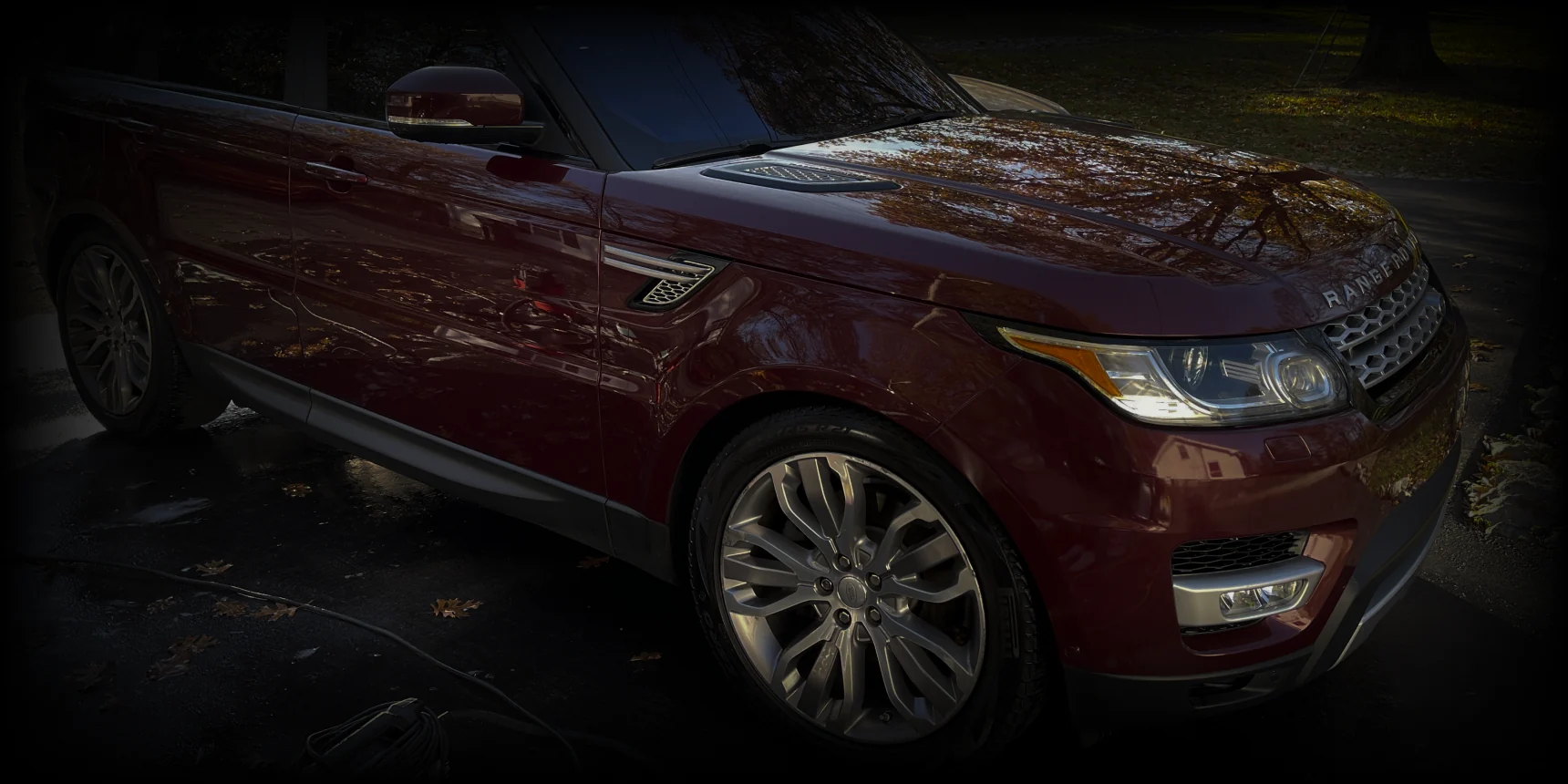 Paint correction detail on a red vehicle